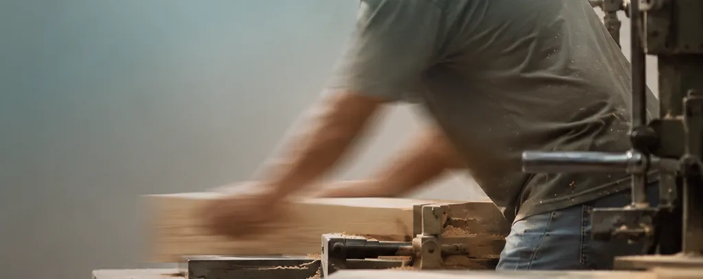 man working with wood